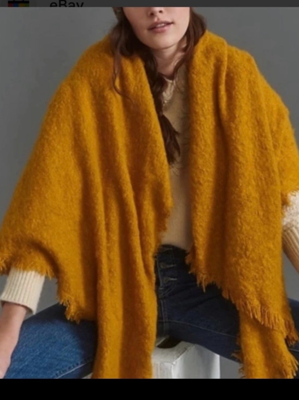 the Carraway Boucle Fringed Scarf by Anthropologie